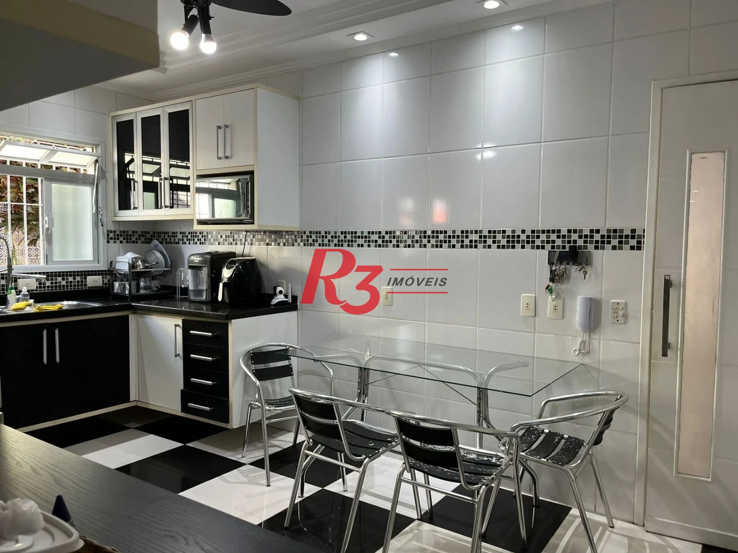 Casa à venda, 146 m² por R$ 1.100.000,00 - Macuco - Santos/SP