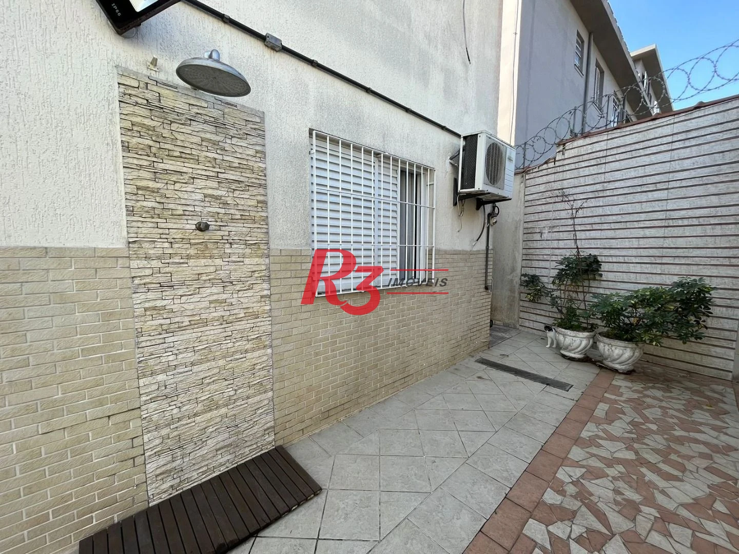 Casa à venda, 146 m² por R$ 1.100.000,00 - Macuco - Santos/SP
