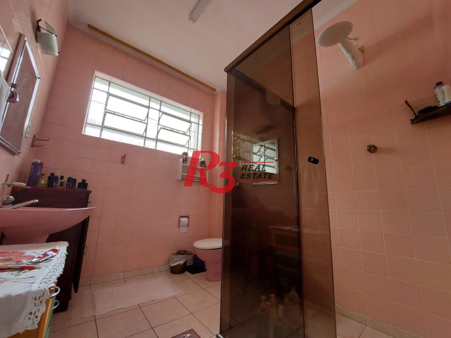 Sobrado com 3 dormitórios à venda, 149 m² por R$ 1.500.000,00 - Ponta da Praia - Santos/SP