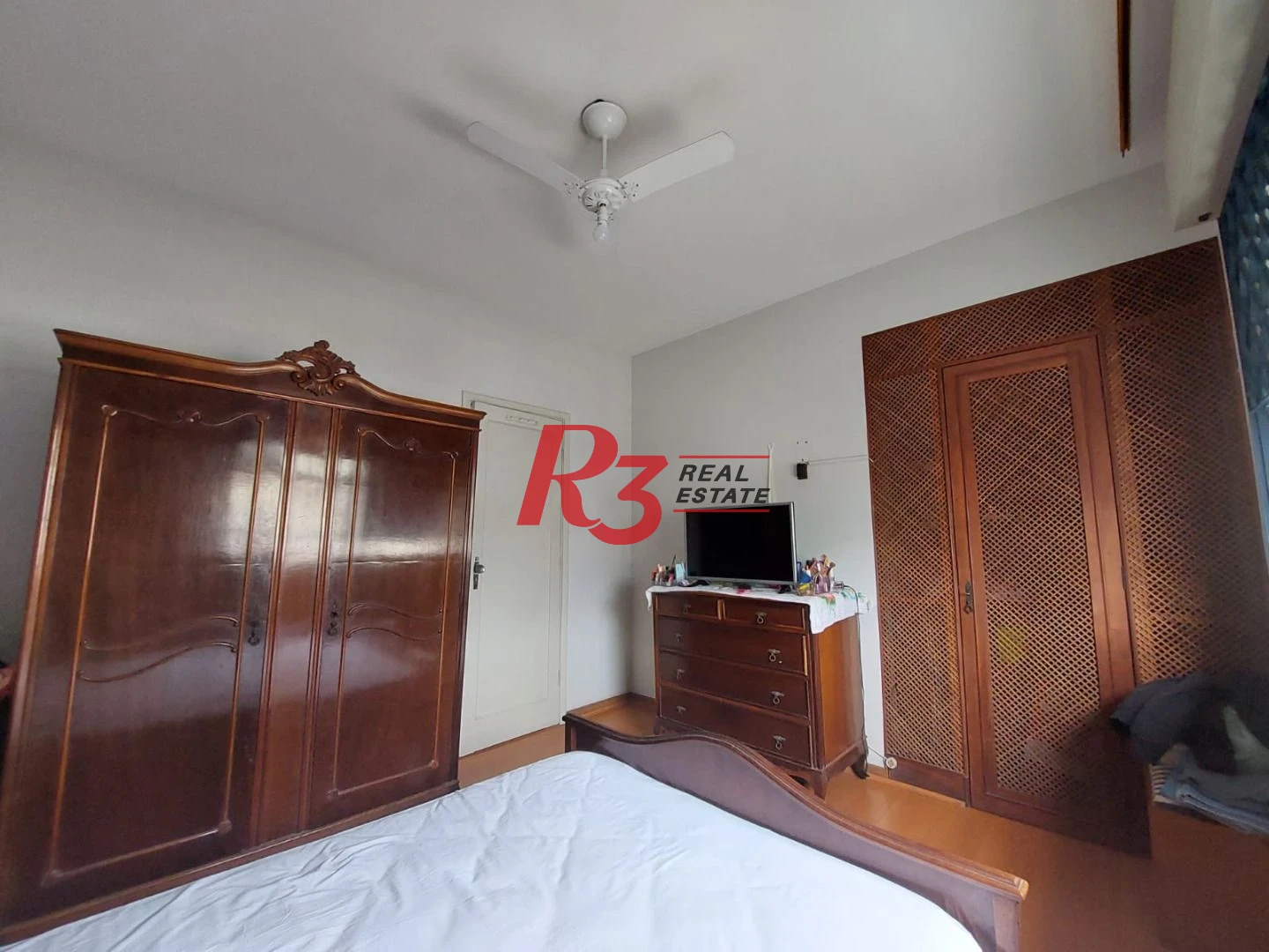 Sobrado com 3 dormitórios à venda, 149 m² por R$ 1.500.000,00 - Ponta da Praia - Santos/SP