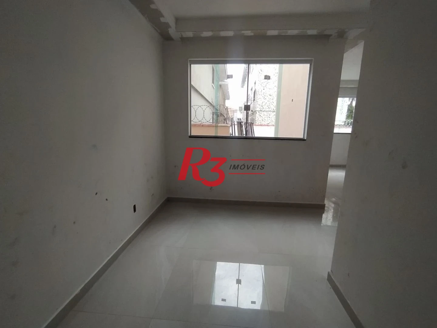 Casa com 3 dormitórios à venda, 95 m² por R$ 1.230.000,00 - Campo Grande - Santos/SP
