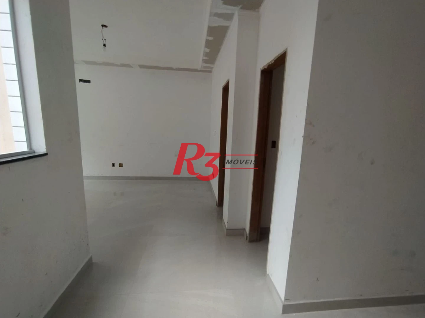 Casa com 3 dormitórios à venda, 95 m² por R$ 1.230.000,00 - Campo Grande - Santos/SP