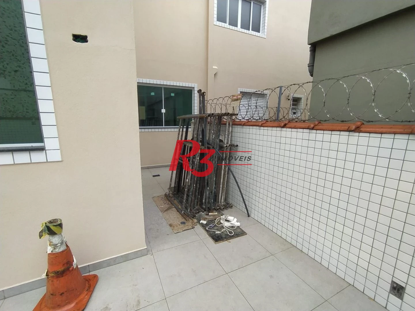 Casa com 3 dormitórios à venda, 95 m² por R$ 1.230.000,00 - Campo Grande - Santos/SP