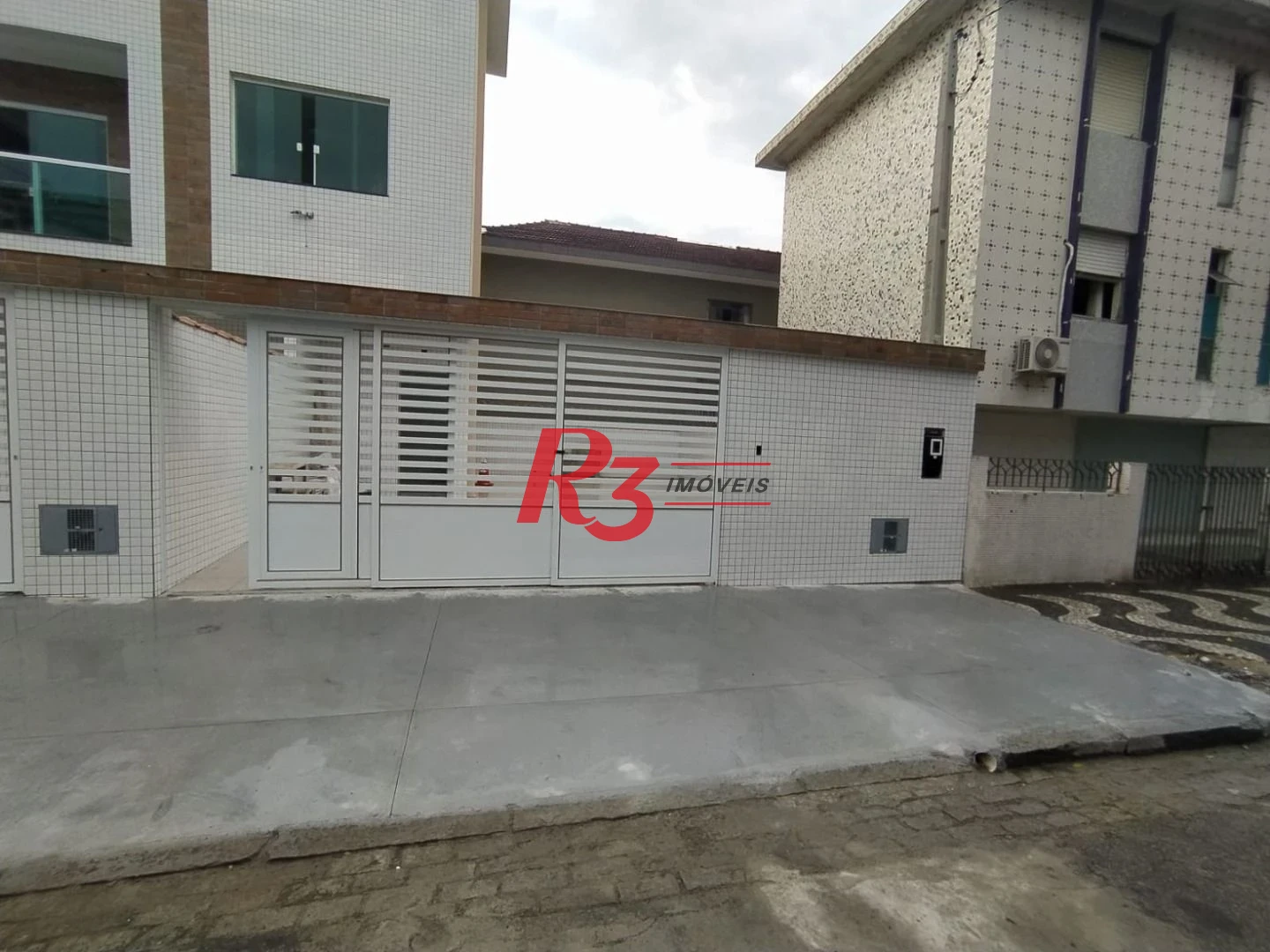 Casa com 3 dormitórios à venda, 95 m² por R$ 1.230.000,00 - Campo Grande - Santos/SP