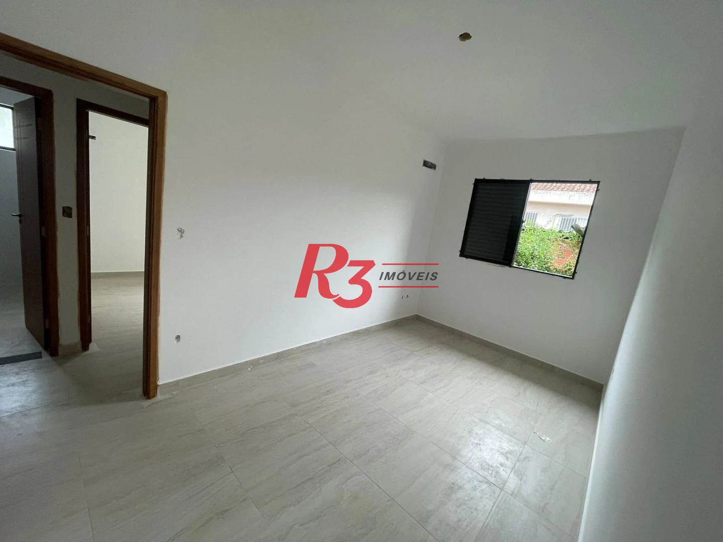 Sobrado fundos com 3 dormitórios, 1 suíte à venda, 152 m² por R$ 846.000 - Vila Belmiro - Santos/SP