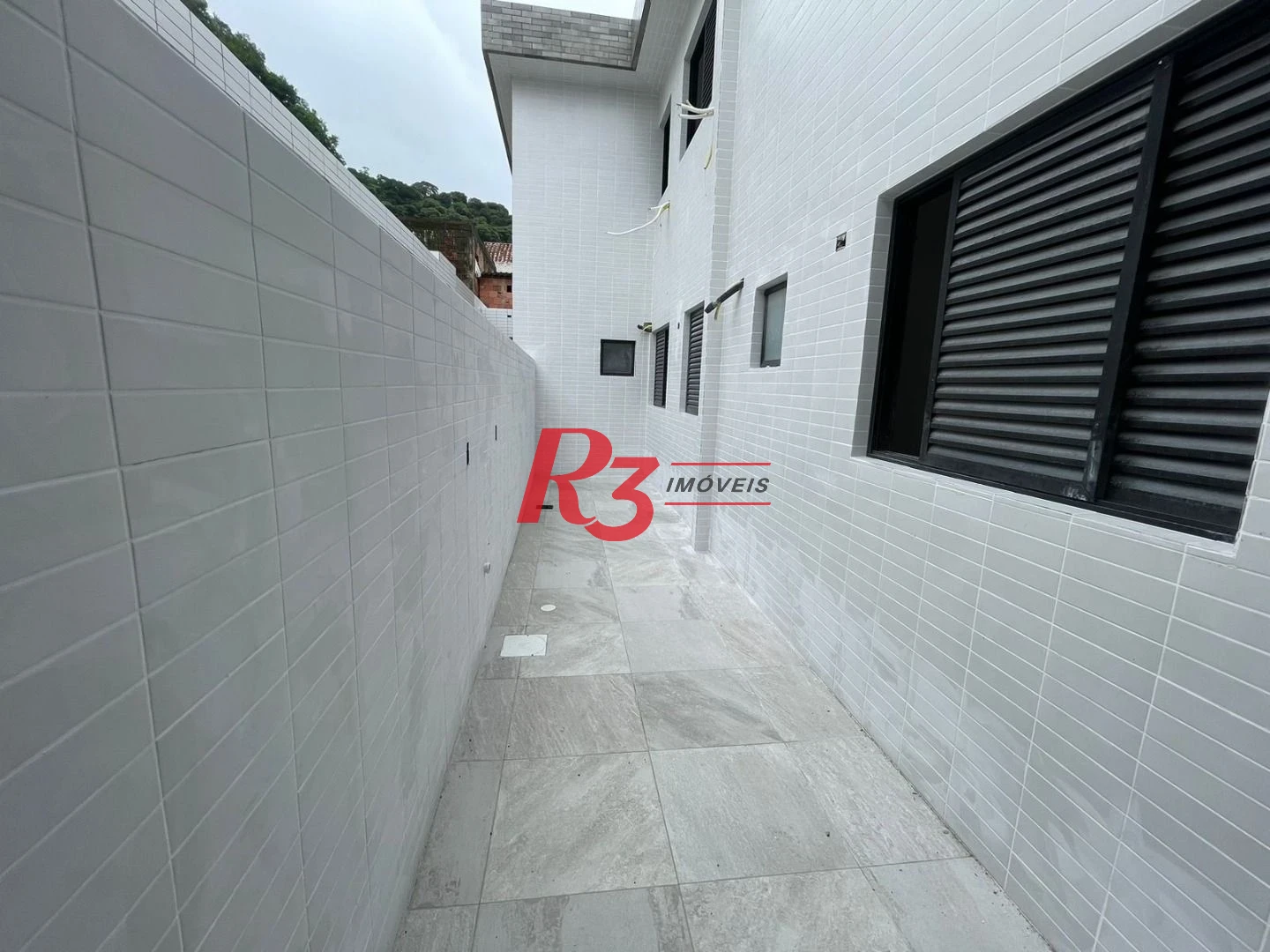 Casa sobreposta térrea com 3 dormitórios, 1 suíte à venda, 114 m² por R$ 805.000 - Vila Belmiro - Santos/SP