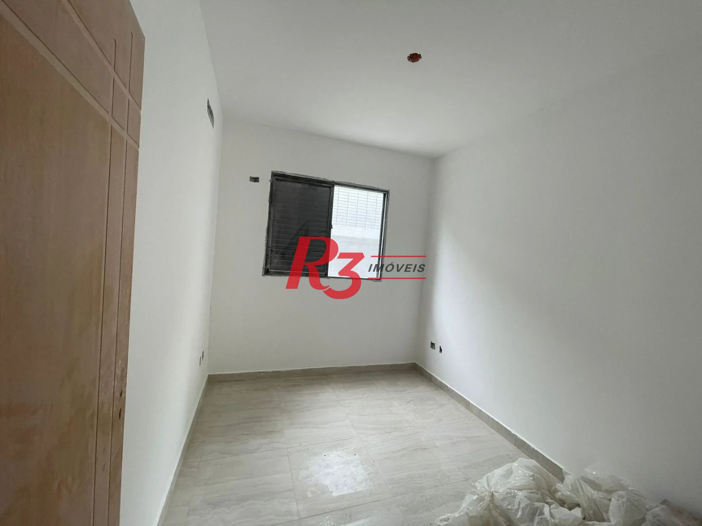 Casa sobreposta térrea com 3 dormitórios, 1 suíte à venda, 114 m² por R$ 805.000 - Vila Belmiro - Santos/SP