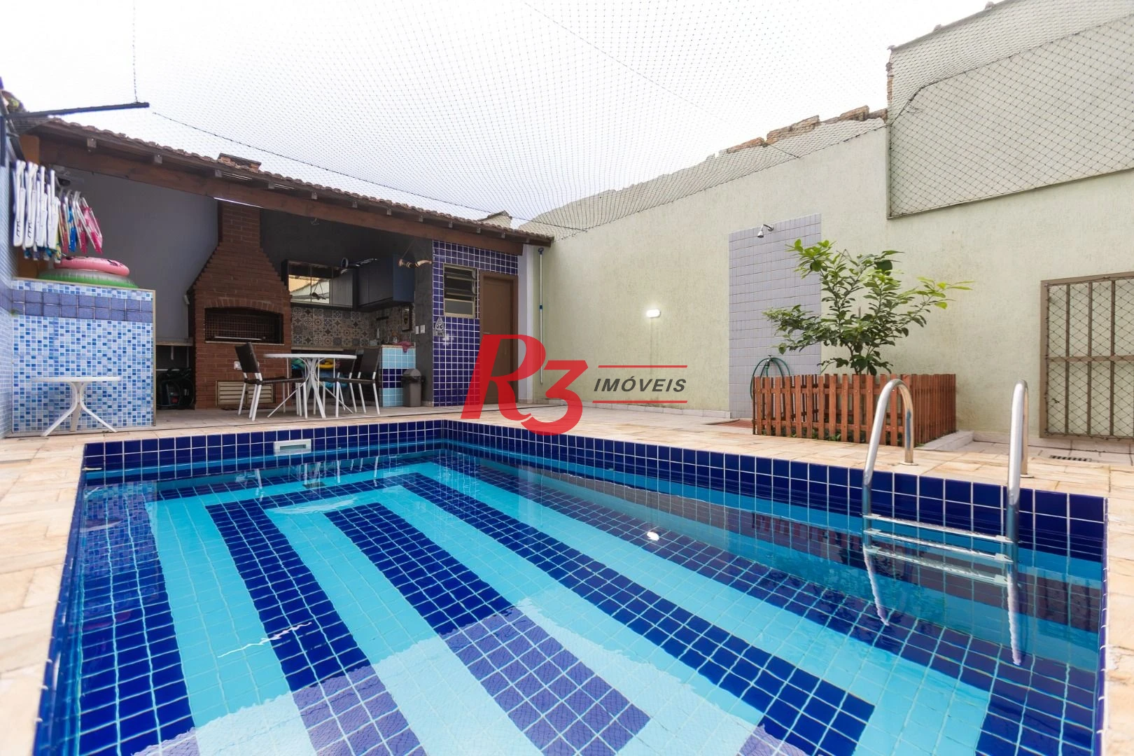 Sobrado com 3 dormitórios à venda, 189 m² por R$ 1.500.000,00 - Campo Grande - Santos/SP