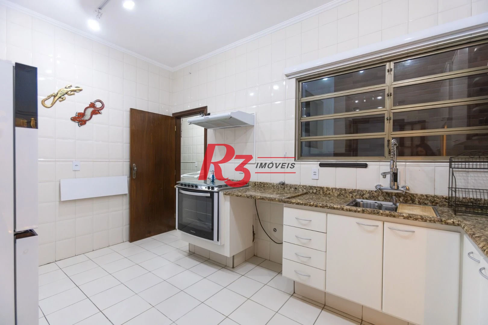 Sobrado com 3 dormitórios à venda, 189 m² por R$ 1.500.000,00 - Campo Grande - Santos/SP