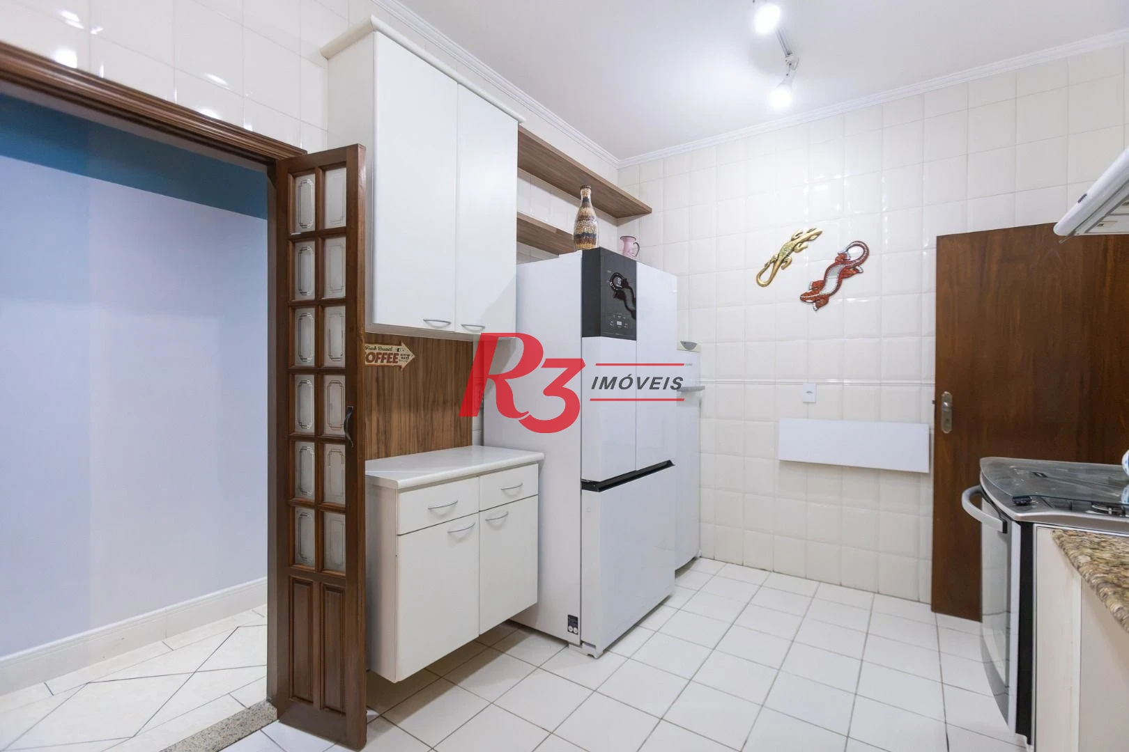 Sobrado com 3 dormitórios à venda, 189 m² por R$ 1.500.000,00 - Campo Grande - Santos/SP