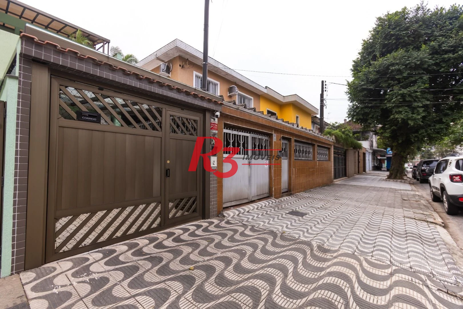 Sobrado com 3 dormitórios à venda, 189 m² por R$ 1.500.000,00 - Campo Grande - Santos/SP