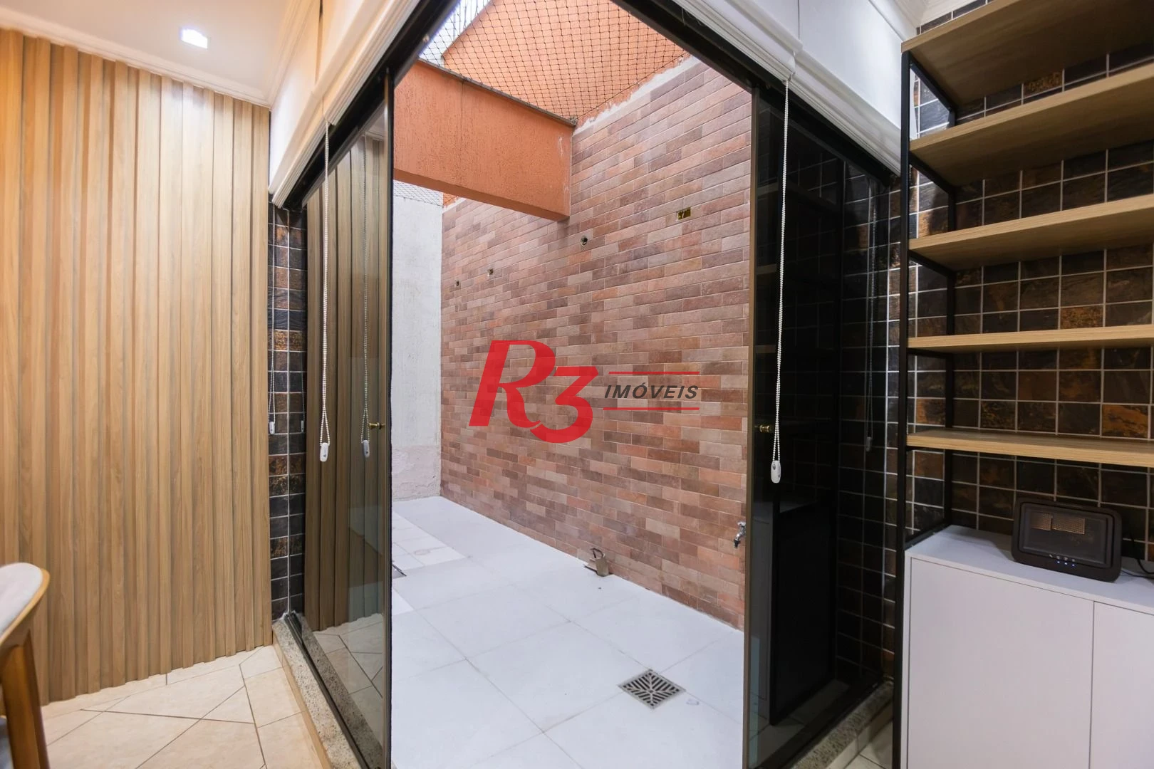 Sobrado com 3 dormitórios à venda, 189 m² por R$ 1.500.000,00 - Campo Grande - Santos/SP
