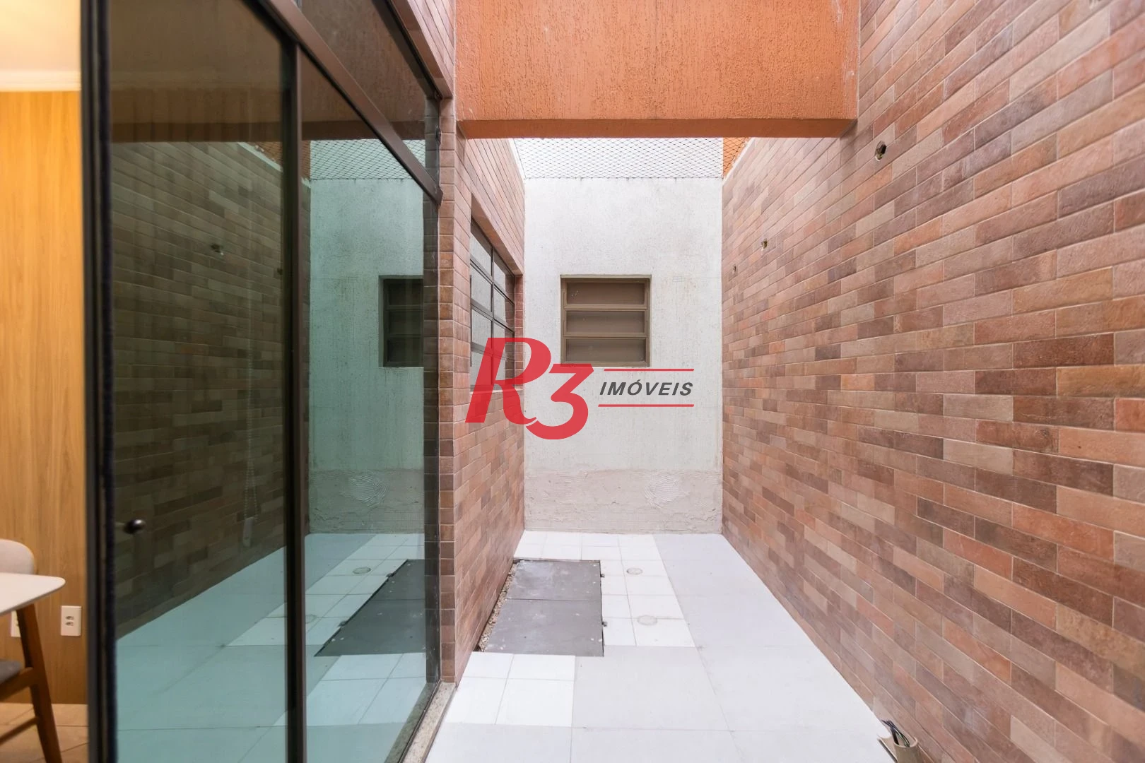 Sobrado com 3 dormitórios à venda, 189 m² por R$ 1.500.000,00 - Campo Grande - Santos/SP