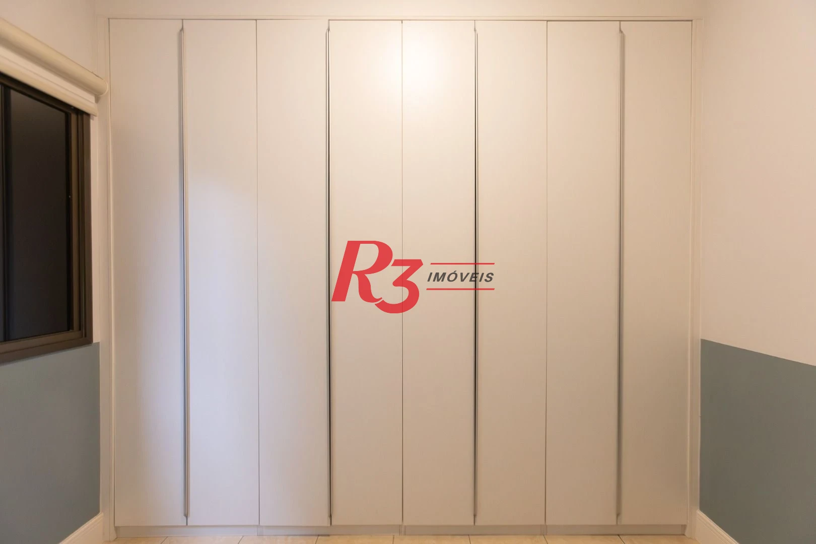 Sobrado com 3 dormitórios à venda, 189 m² por R$ 1.500.000,00 - Campo Grande - Santos/SP