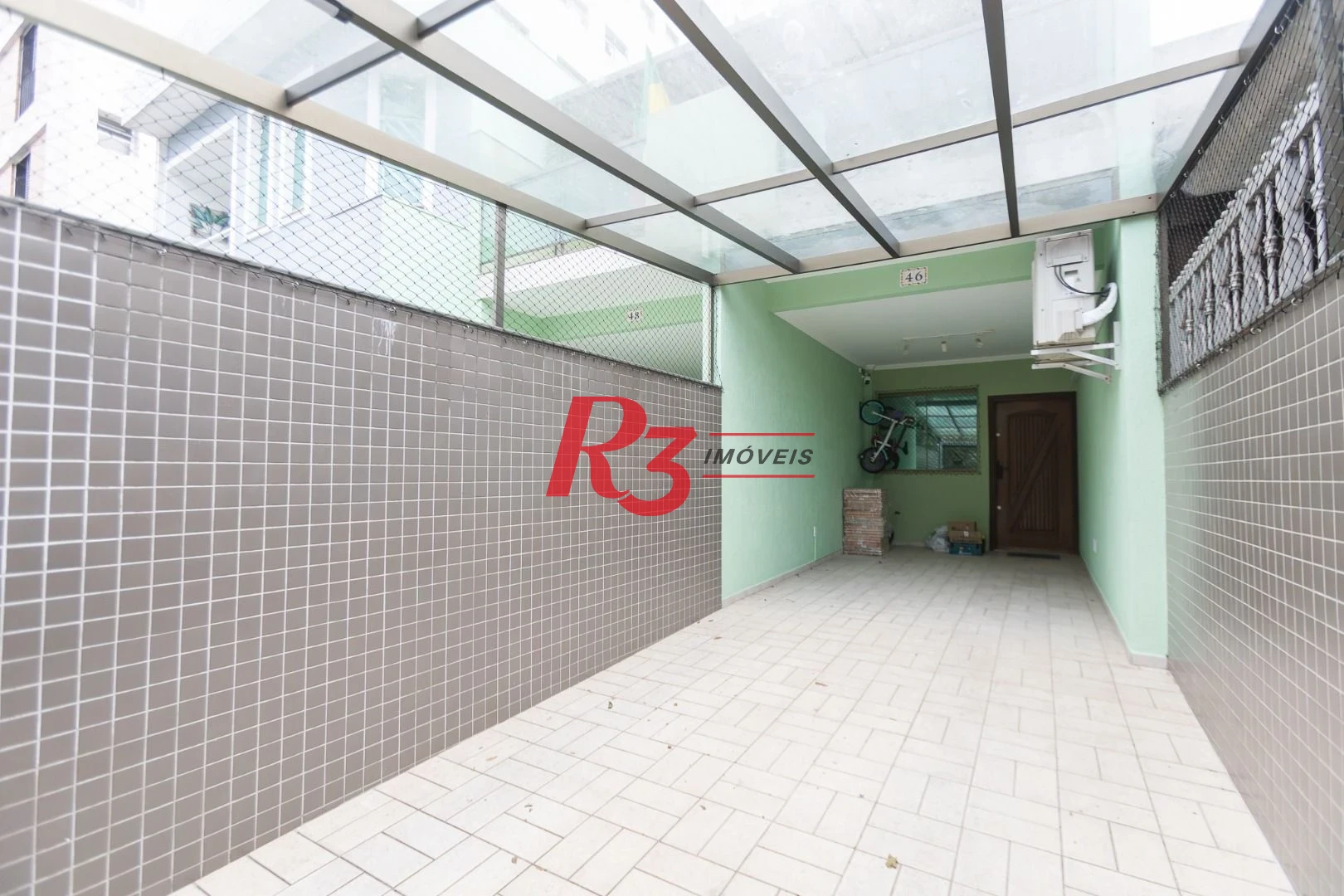 Sobrado com 3 dormitórios à venda, 189 m² por R$ 1.500.000,00 - Campo Grande - Santos/SP