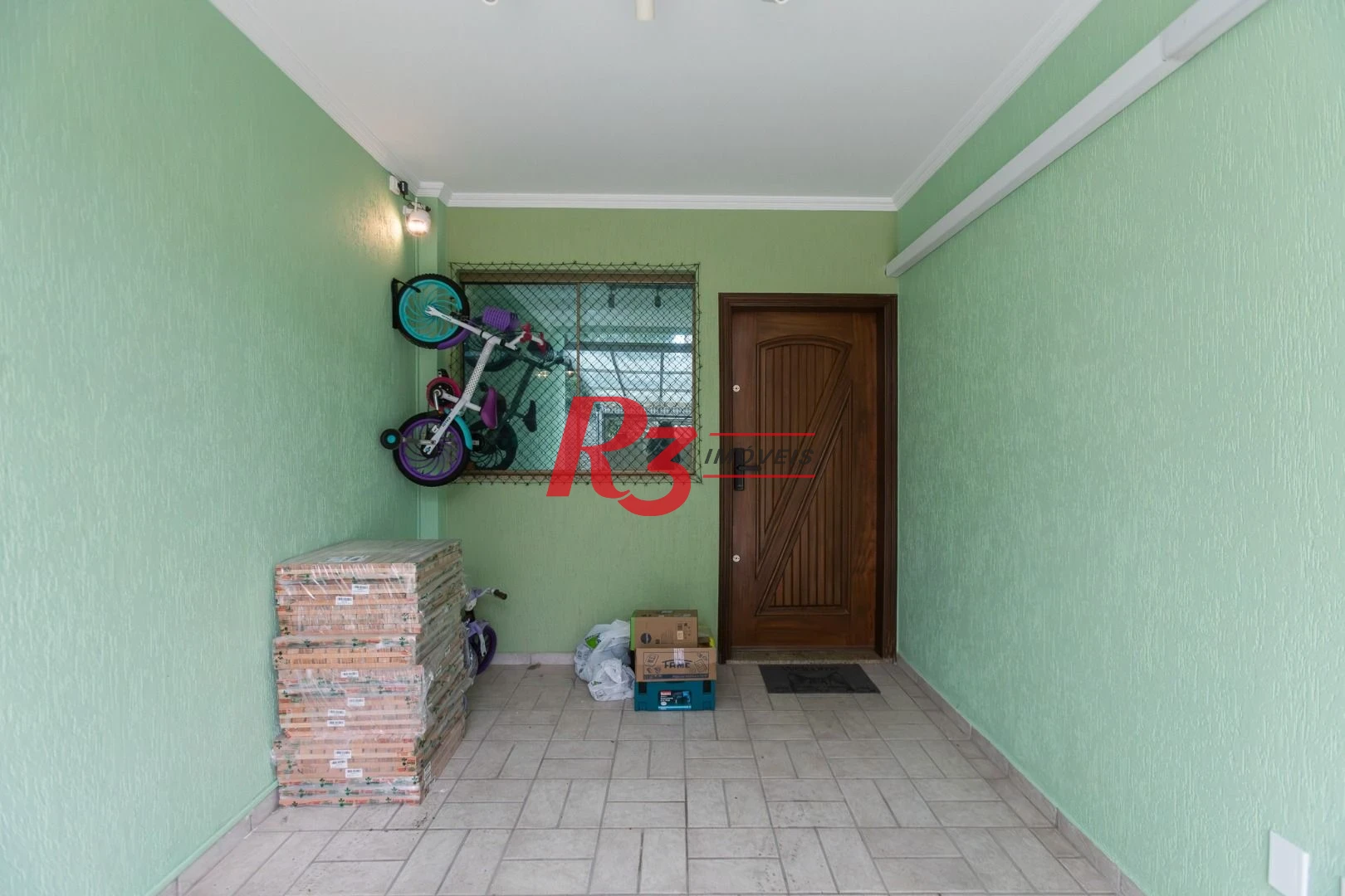 Sobrado com 3 dormitórios à venda, 189 m² por R$ 1.500.000,00 - Campo Grande - Santos/SP