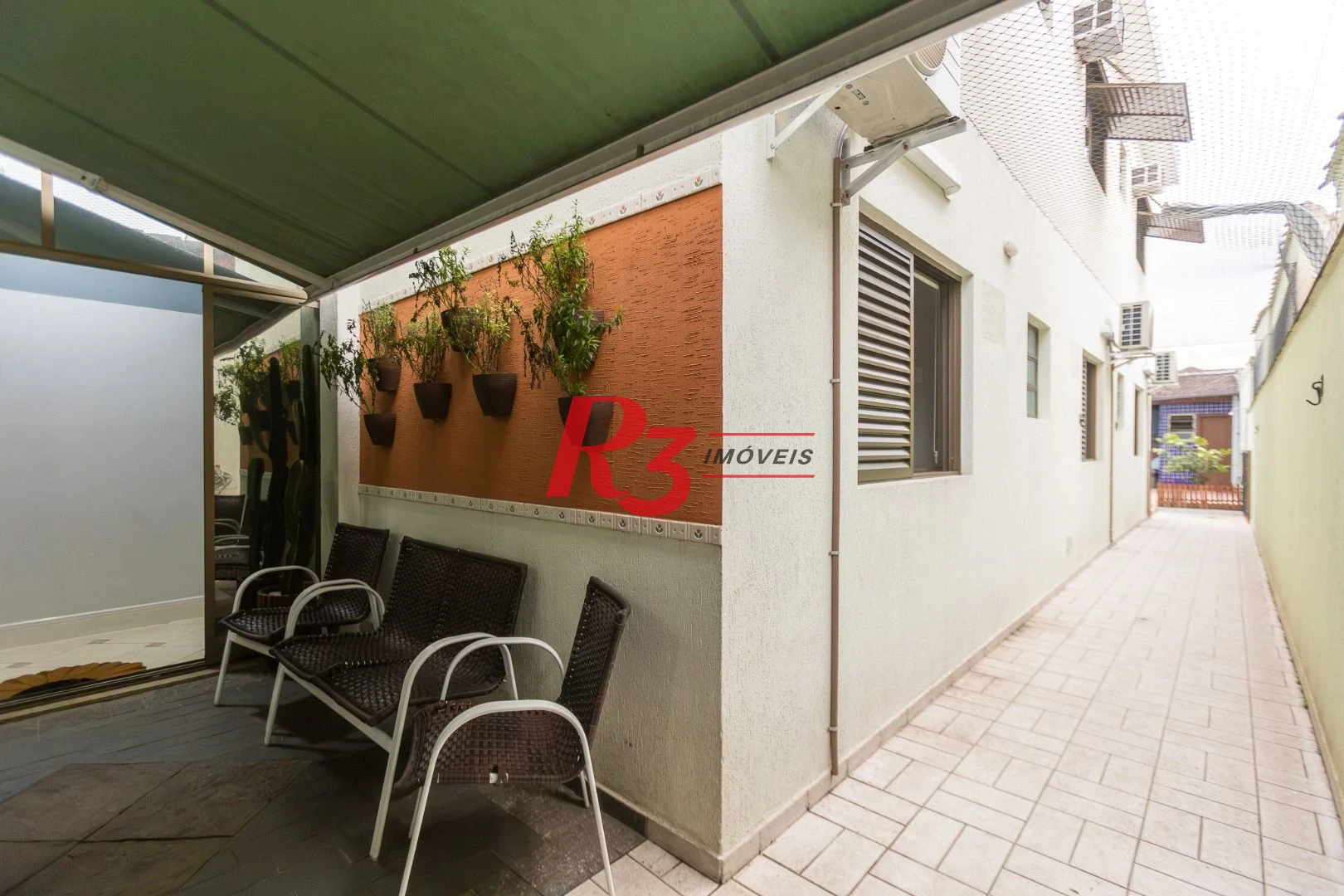 Sobrado com 3 dormitórios à venda, 189 m² por R$ 1.500.000,00 - Campo Grande - Santos/SP