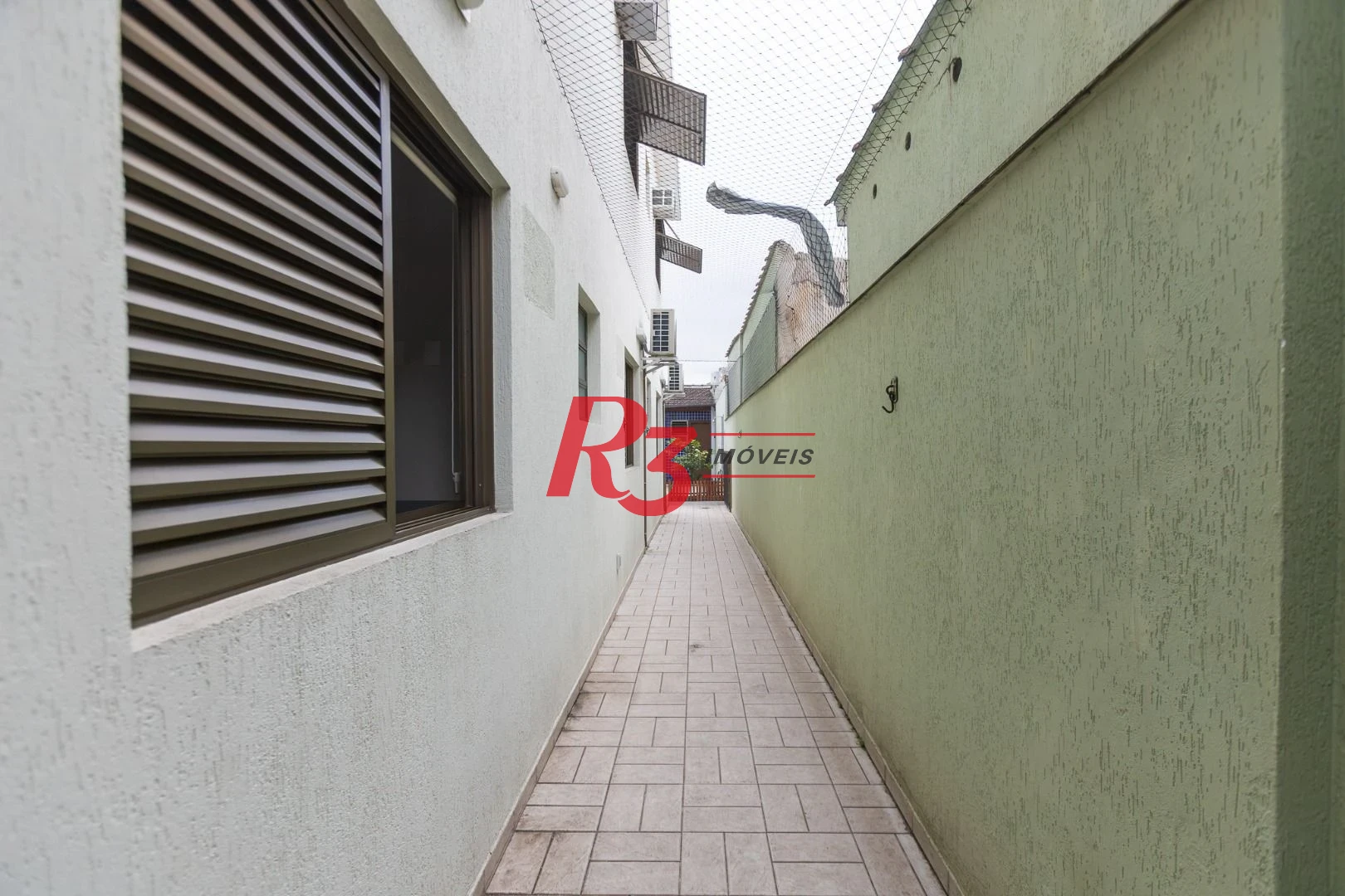 Sobrado com 3 dormitórios à venda, 189 m² por R$ 1.500.000,00 - Campo Grande - Santos/SP
