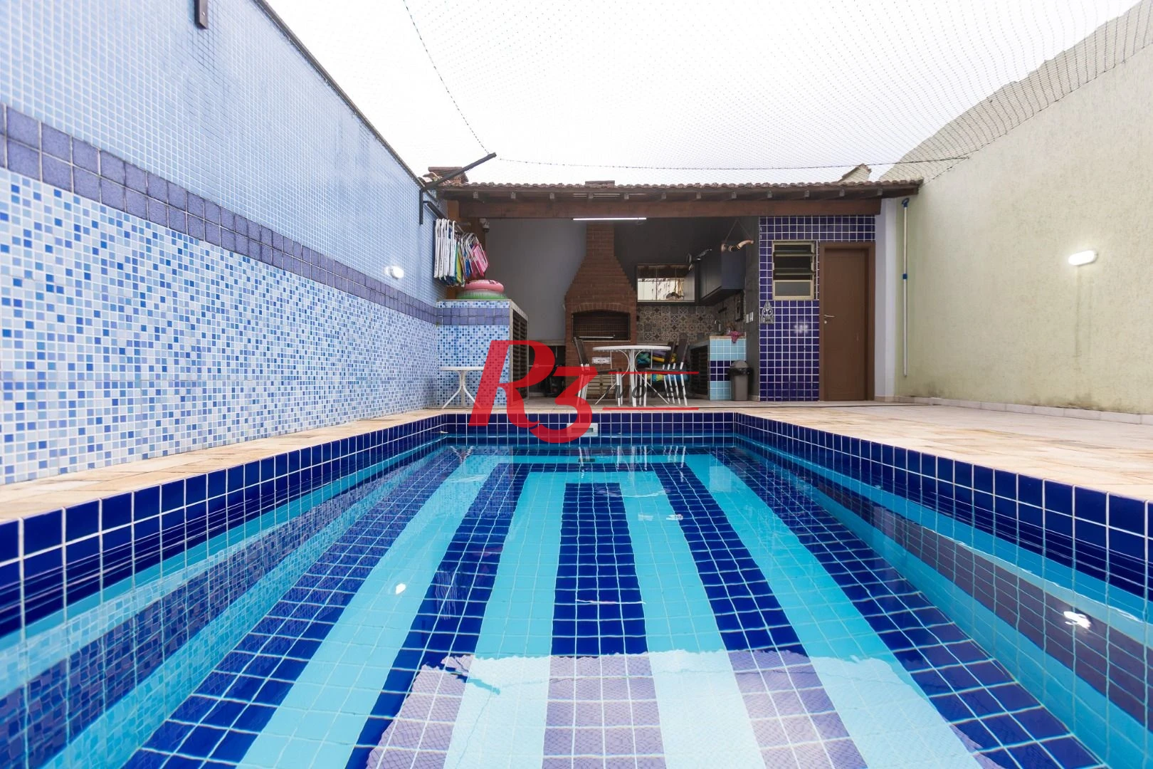 Sobrado com 3 dormitórios à venda, 189 m² por R$ 1.500.000,00 - Campo Grande - Santos/SP