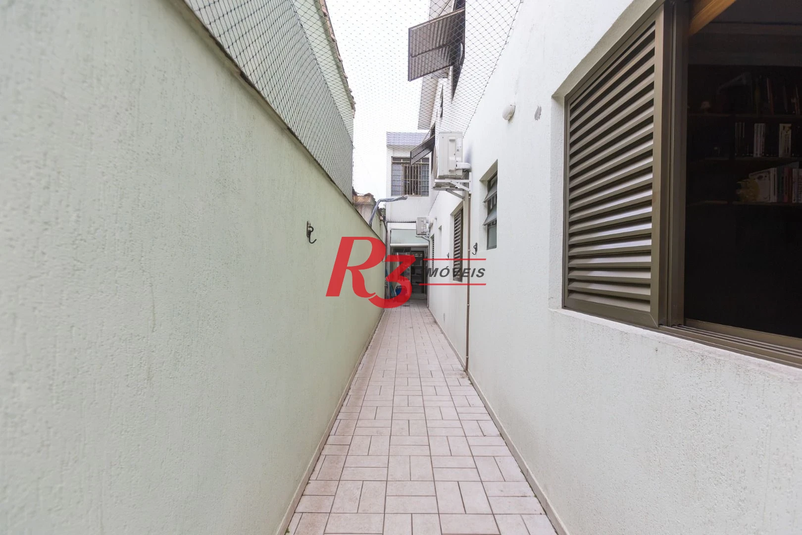Sobrado com 3 dormitórios à venda, 189 m² por R$ 1.500.000,00 - Campo Grande - Santos/SP