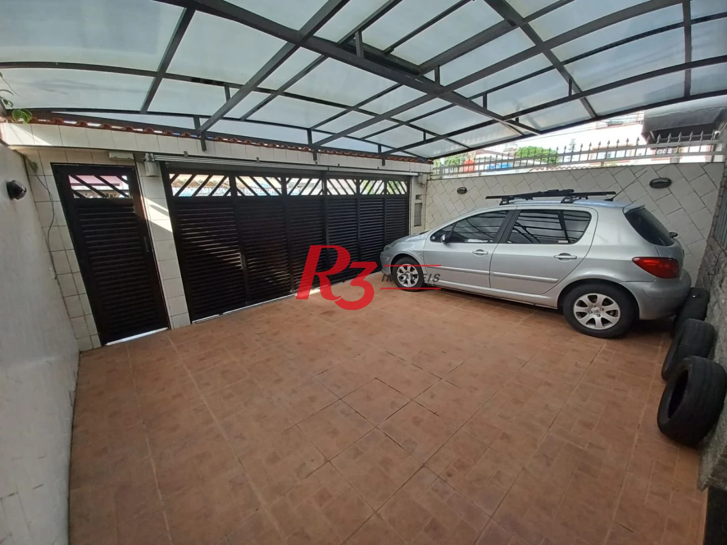 Casa com 3 dormitórios à venda, 157 m² por R$ 945.000,00 - Encruzilhada - Santos/SP
