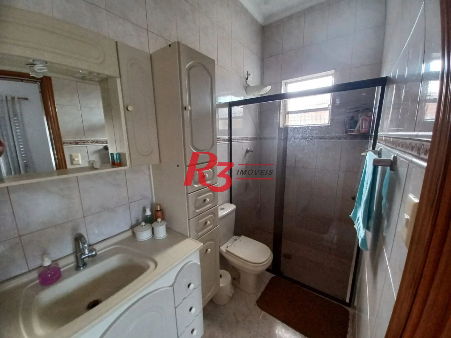 Casa com 3 dormitórios à venda, 157 m² por R$ 945.000,00 - Encruzilhada - Santos/SP