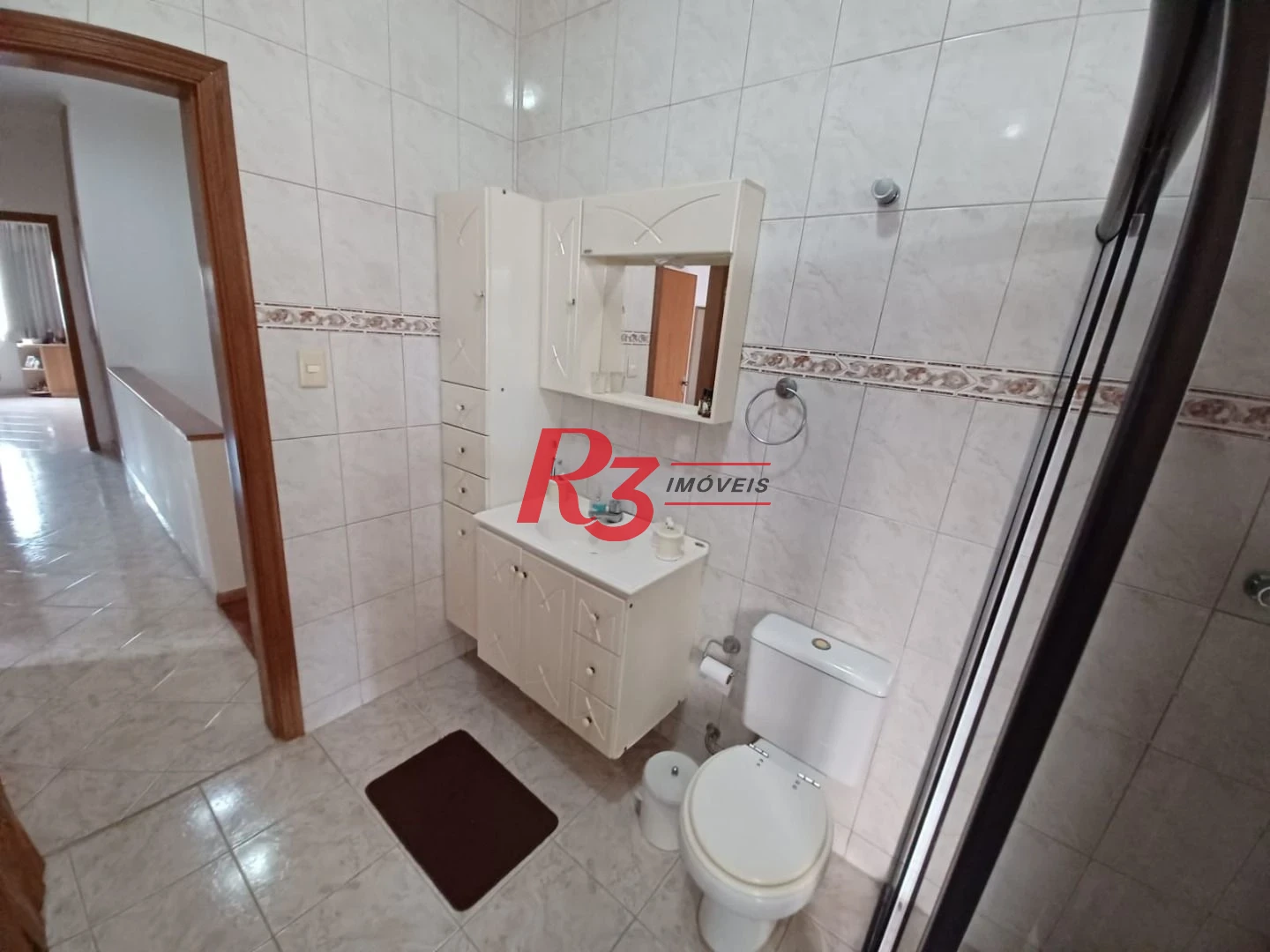 Casa com 3 dormitórios à venda, 157 m² por R$ 945.000,00 - Encruzilhada - Santos/SP