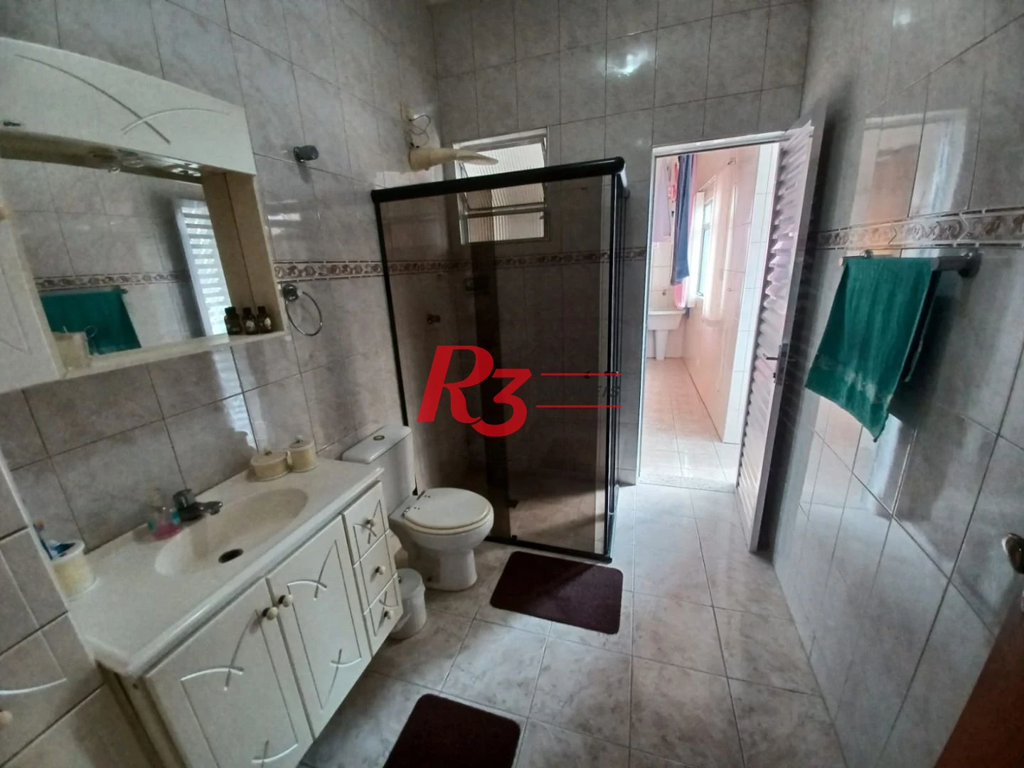 Casa com 3 dormitórios à venda, 157 m² por R$ 945.000,00 - Encruzilhada - Santos/SP