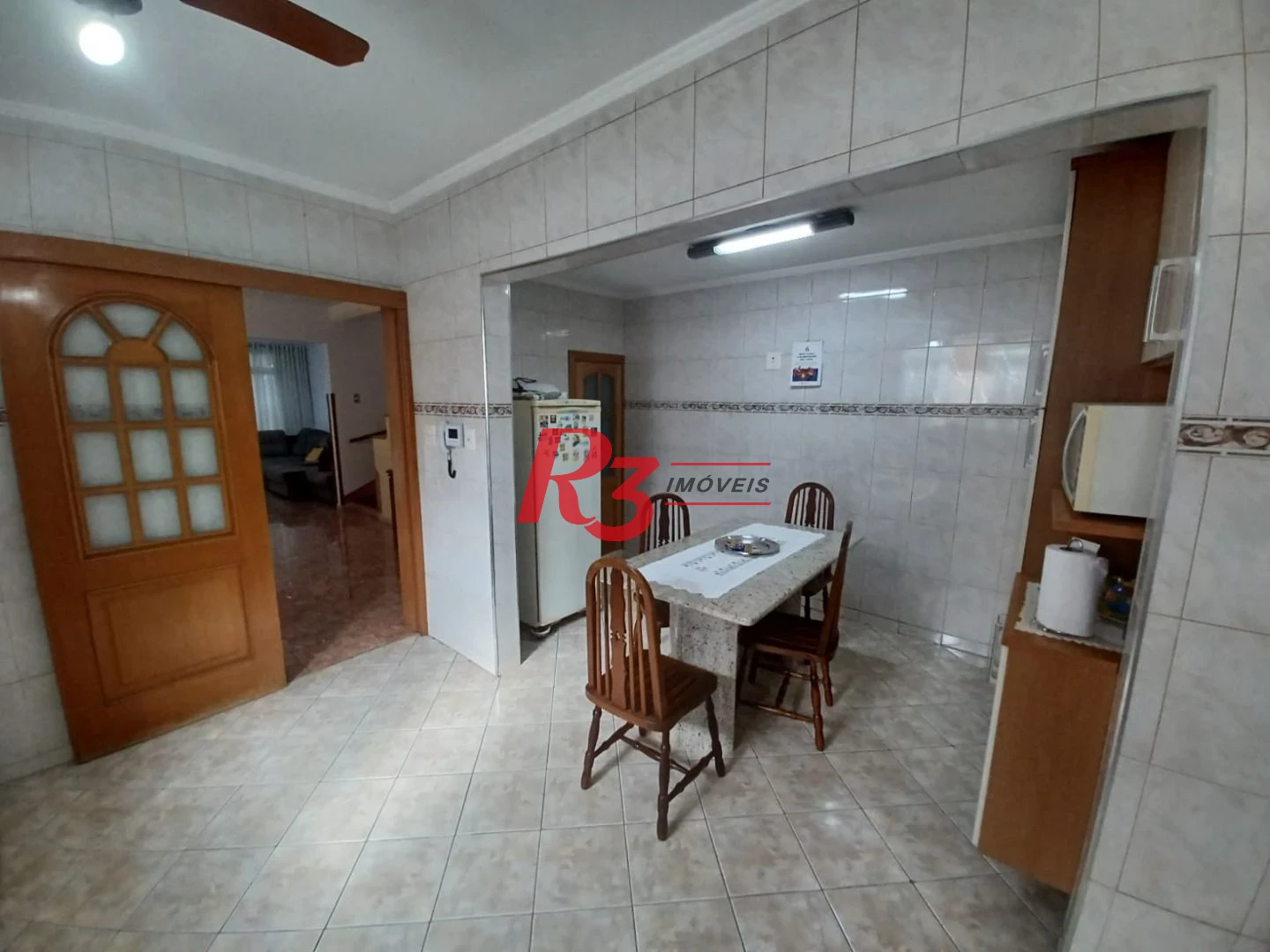 Casa com 3 dormitórios à venda, 157 m² por R$ 945.000,00 - Encruzilhada - Santos/SP