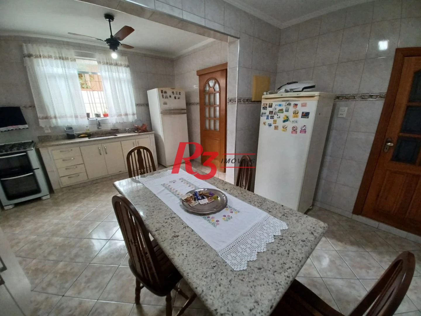 Casa com 3 dormitórios à venda, 157 m² por R$ 945.000,00 - Encruzilhada - Santos/SP