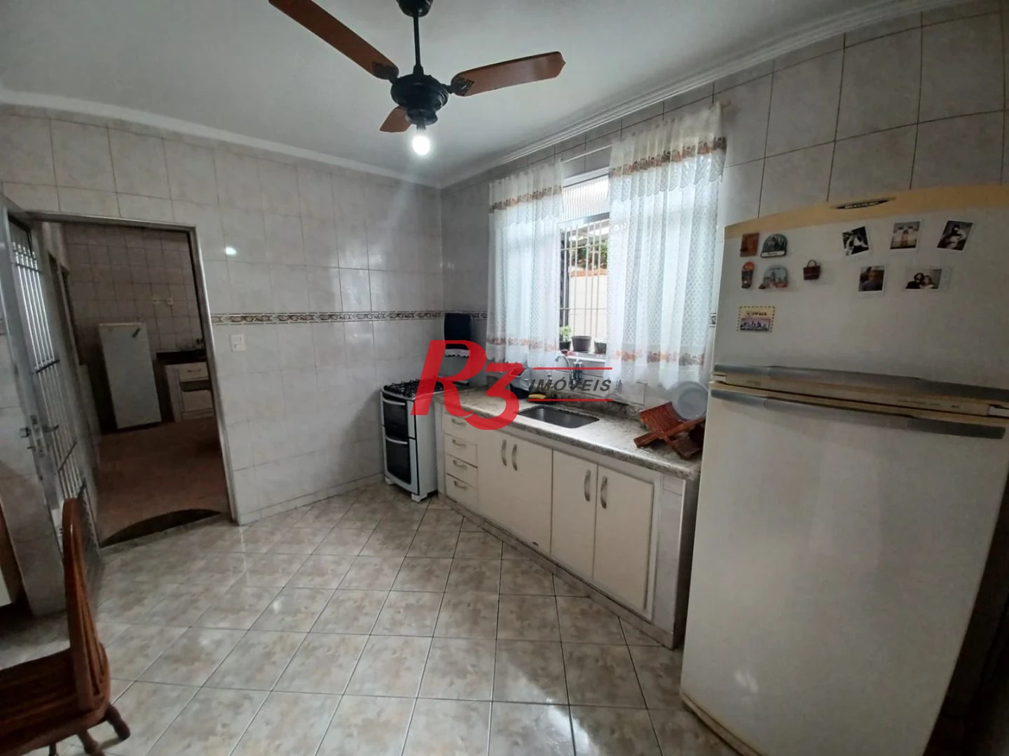 Casa com 3 dormitórios à venda, 157 m² por R$ 945.000,00 - Encruzilhada - Santos/SP