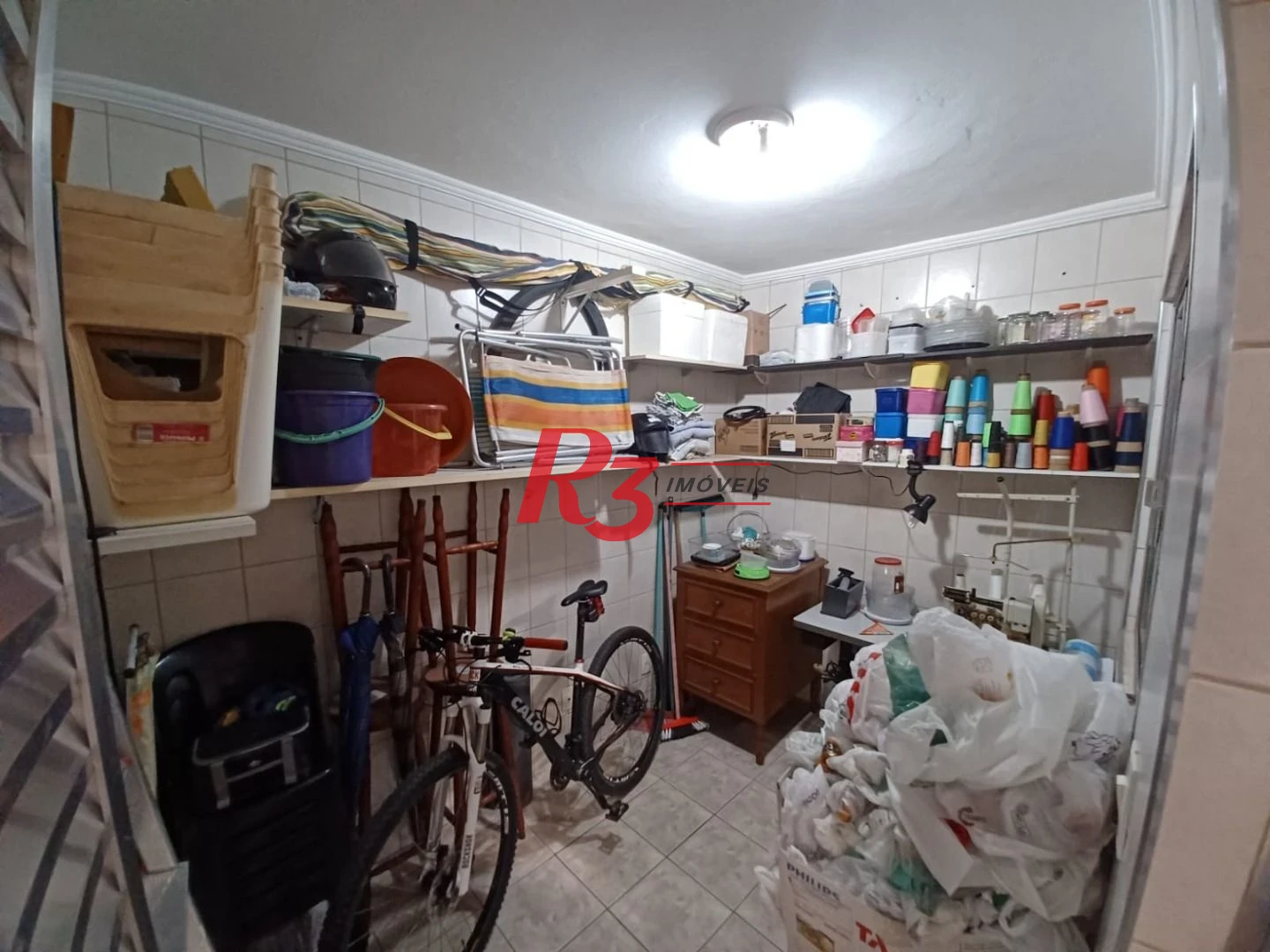 Casa com 3 dormitórios à venda, 157 m² por R$ 945.000,00 - Encruzilhada - Santos/SP