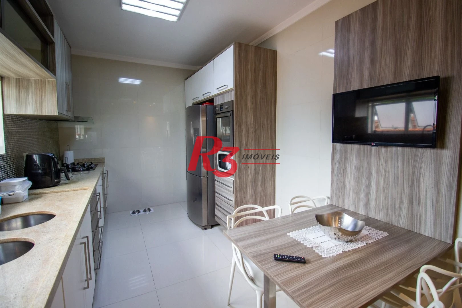 Casa com 3 dormitórios à venda, 189 m² por R$ 1.350.000,00 - Embaré - Santos/SP