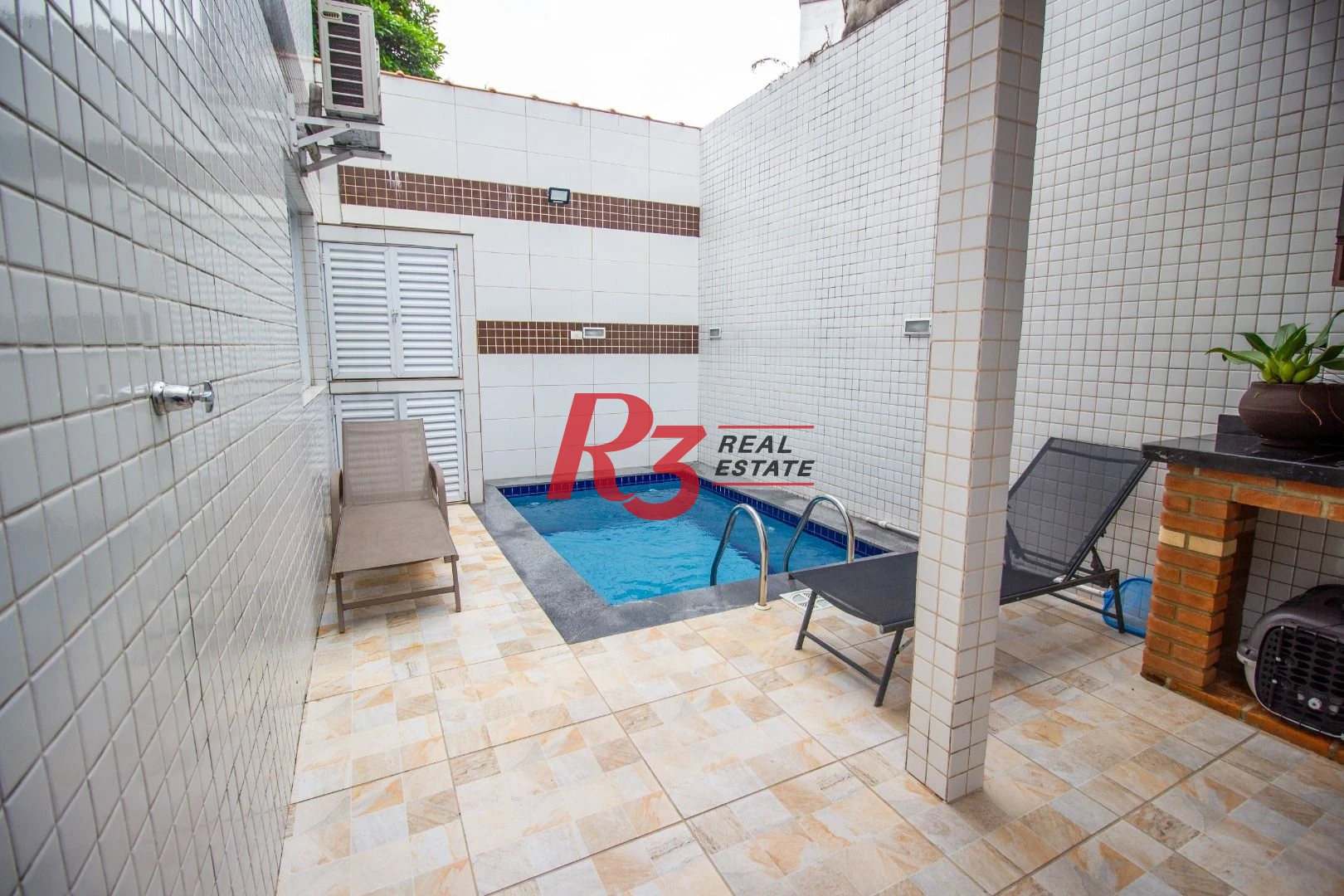 Casa com 3 dormitórios à venda, 130 m² por R$ 1.150.000,00 - Vila Belmiro - Santos/SP