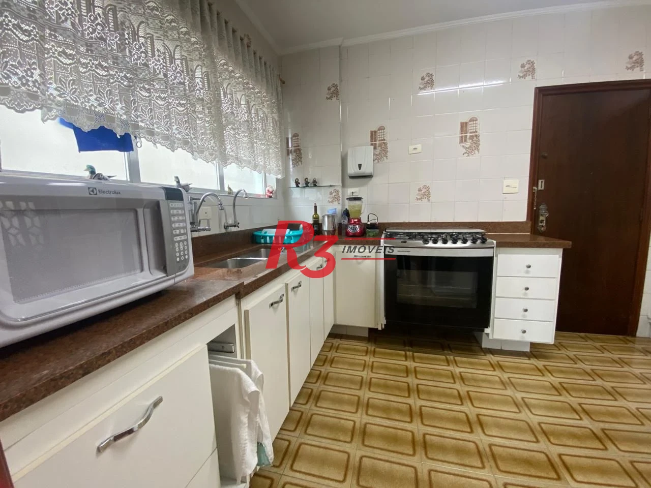 Apartamento com 4 dormitórios à venda, 184 m² por R$ 900.000,00 - Gonzaga - Santos/SP