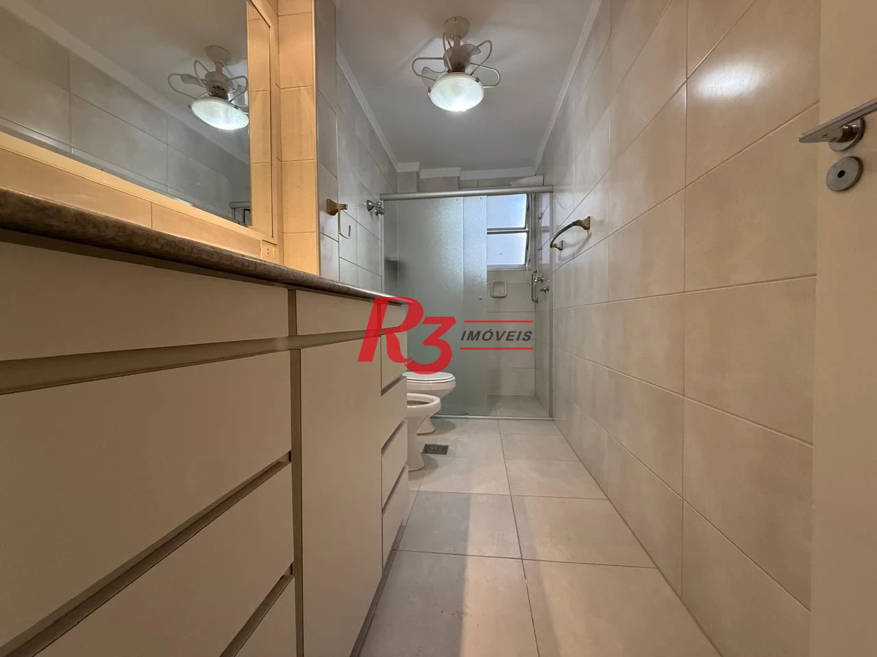Apartamento com 2 dormitórios à venda, 100 m² por R$ 690.000,00 - Gonzaga - Santos/SP