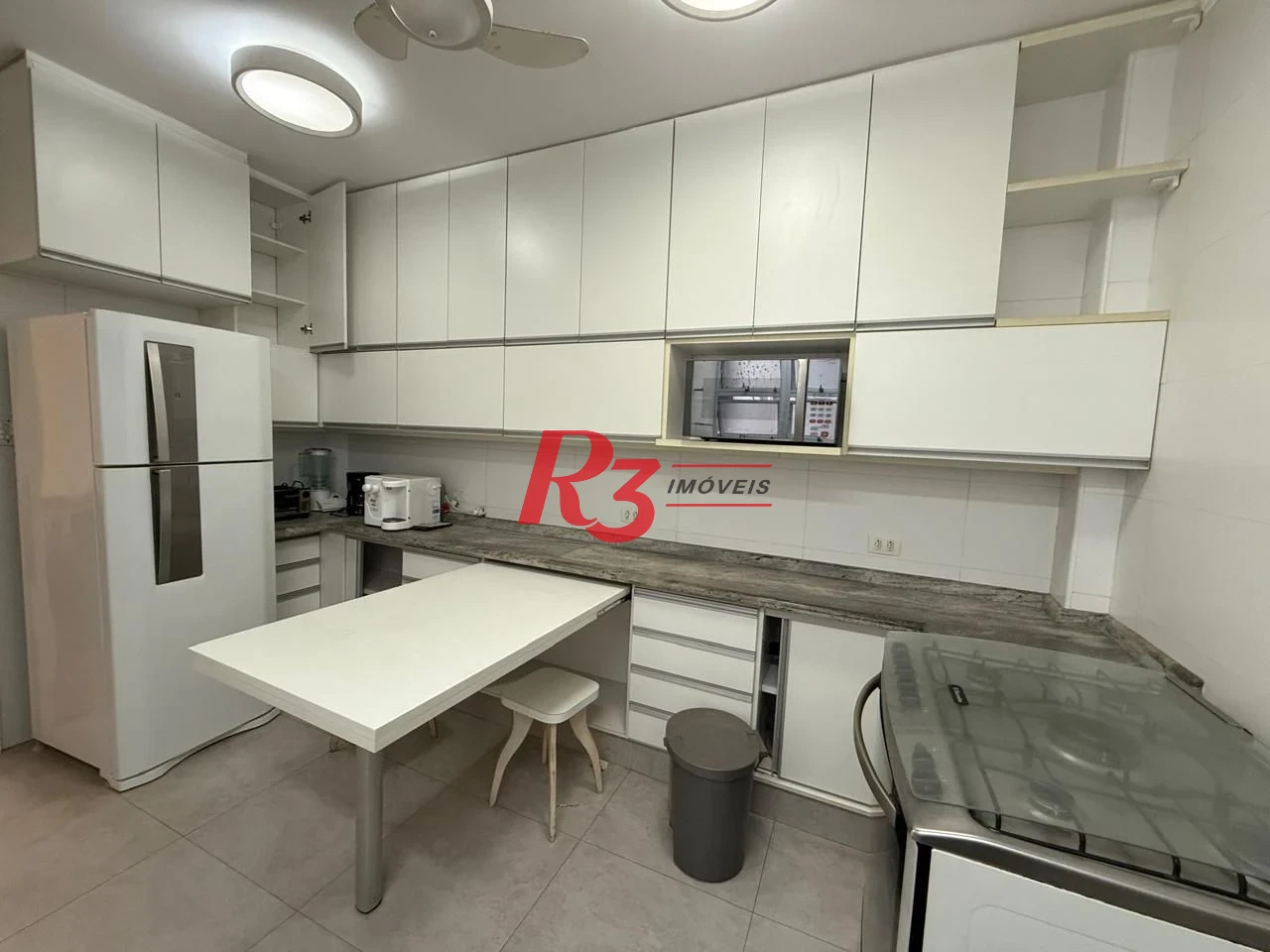 Apartamento com 2 dormitórios à venda, 100 m² por R$ 690.000,00 - Gonzaga - Santos/SP