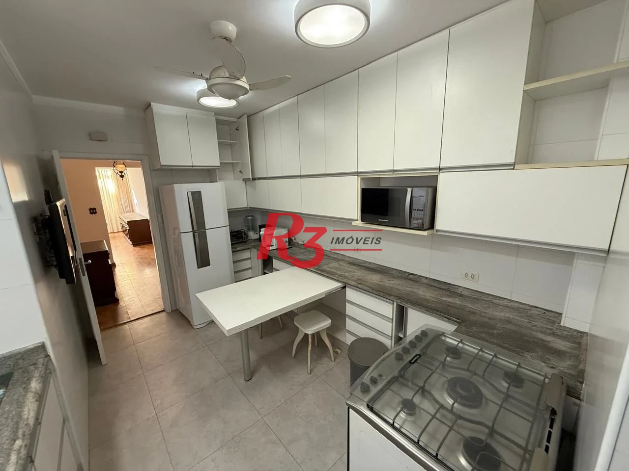 Apartamento com 2 dormitórios à venda, 100 m² por R$ 690.000,00 - Gonzaga - Santos/SP