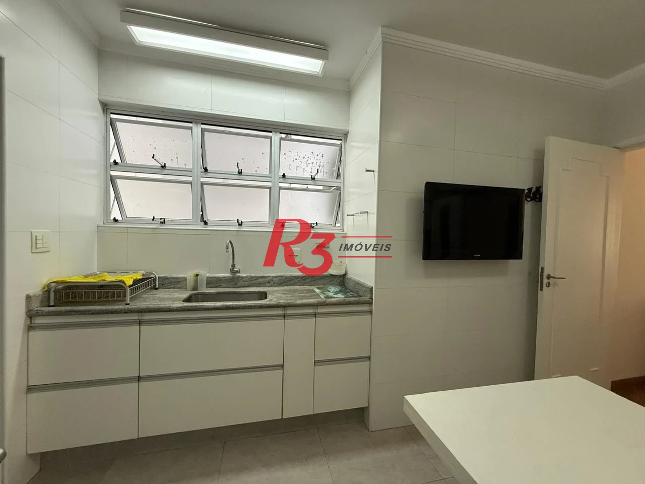 Apartamento com 2 dormitórios à venda, 100 m² por R$ 690.000,00 - Gonzaga - Santos/SP