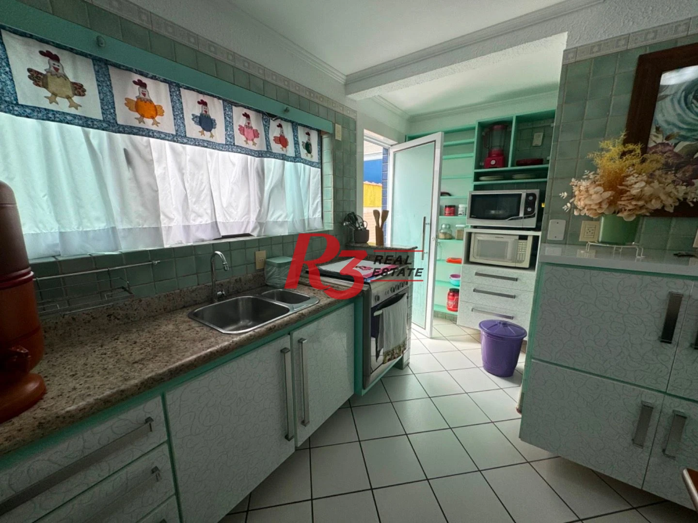 Casa com 3 dormitórios à venda, 125 m² por R$ 1.650.000,00 - Ponta da Praia - Santos/SP