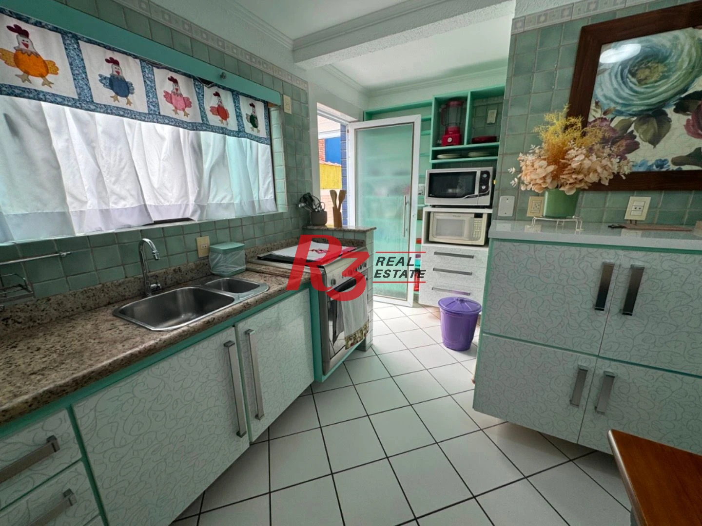 Casa com 3 dormitórios à venda, 125 m² por R$ 1.650.000,00 - Ponta da Praia - Santos/SP