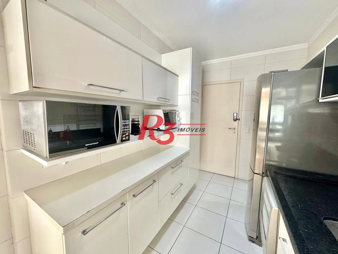 Apartamento com 2 dormitórios à venda, 108 m² por R$ 1.600.000,00 - Gonzaga - Santos/SP