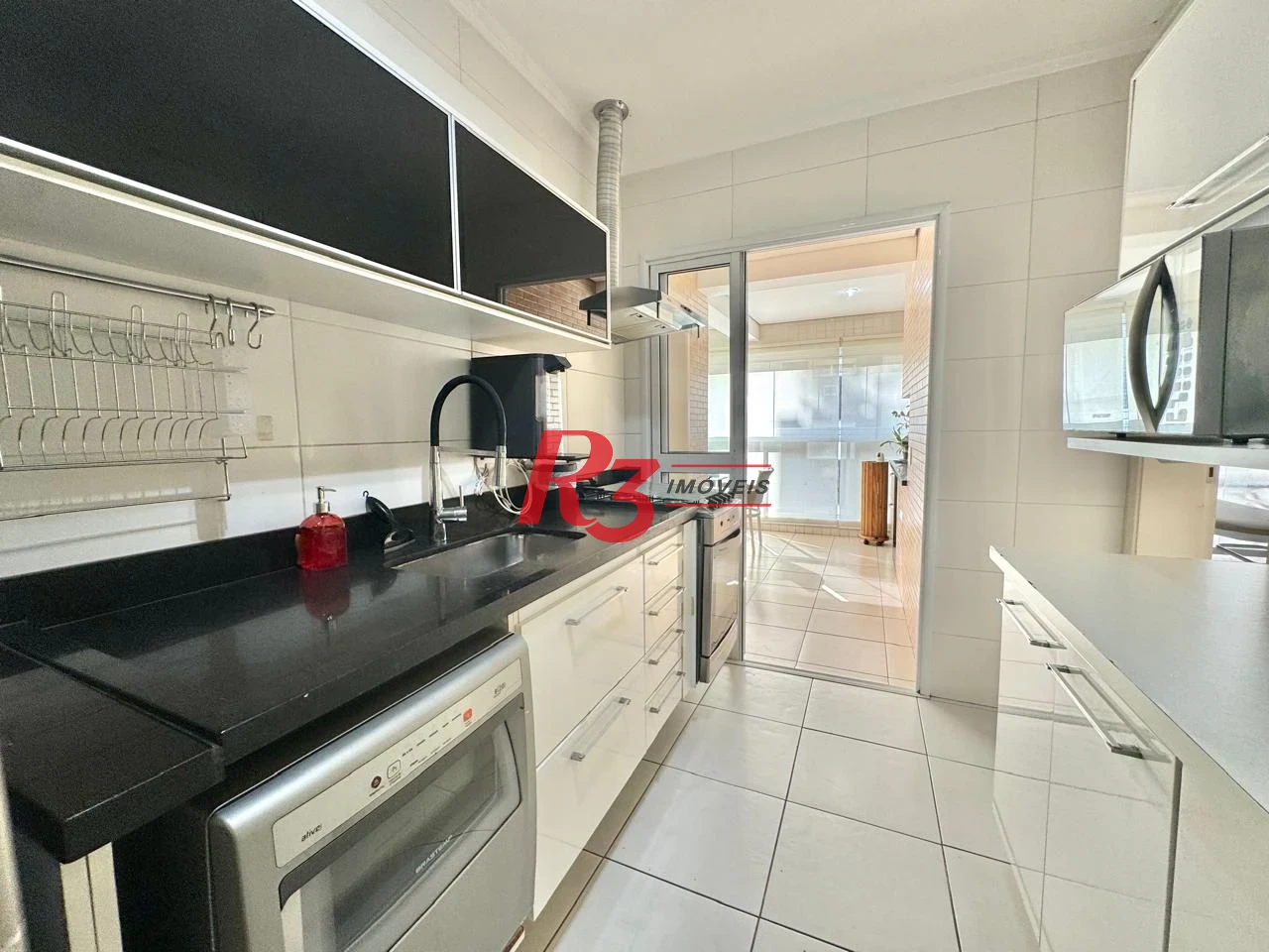 Apartamento com 2 dormitórios à venda, 108 m² por R$ 1.600.000,00 - Gonzaga - Santos/SP