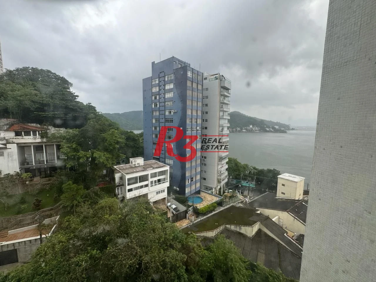 Apartamento com 4 dormitórios à venda, 235 m² por R$ 1.200.000,00 - Ilha Porchat - São Vicente/SP
