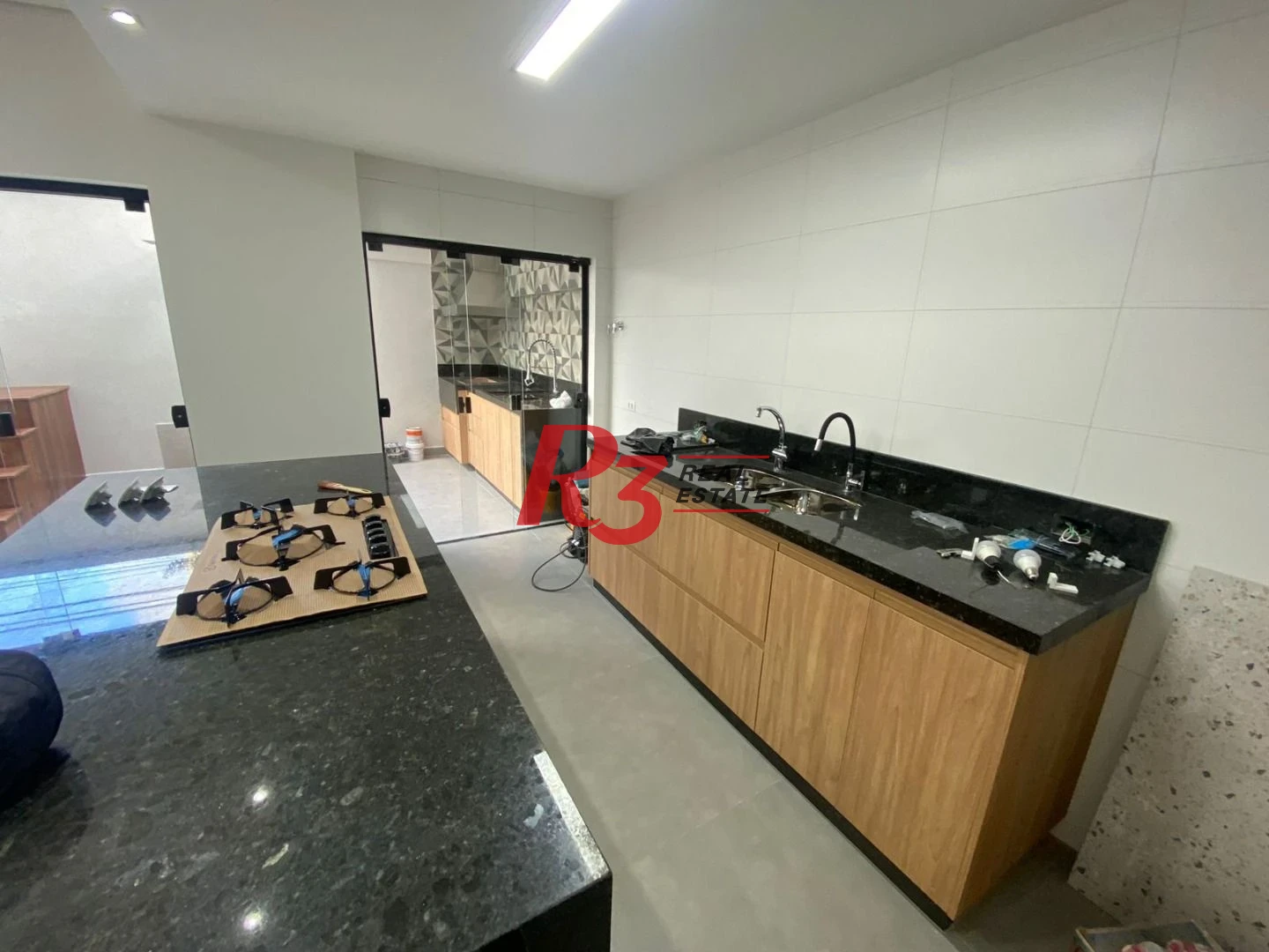 Sobrado com 3 dormitórios à venda, 150 m² por R$ 2.200.000,00 - Ponta da Praia - Santos/SP