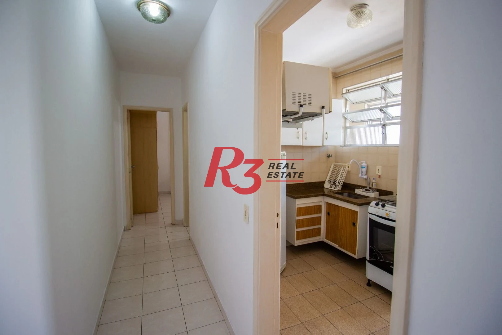 Apartamento com 1 dormitório para alugar, 60 m² por R$ 3.000,00/mês - Gonzaga - Santos/SP