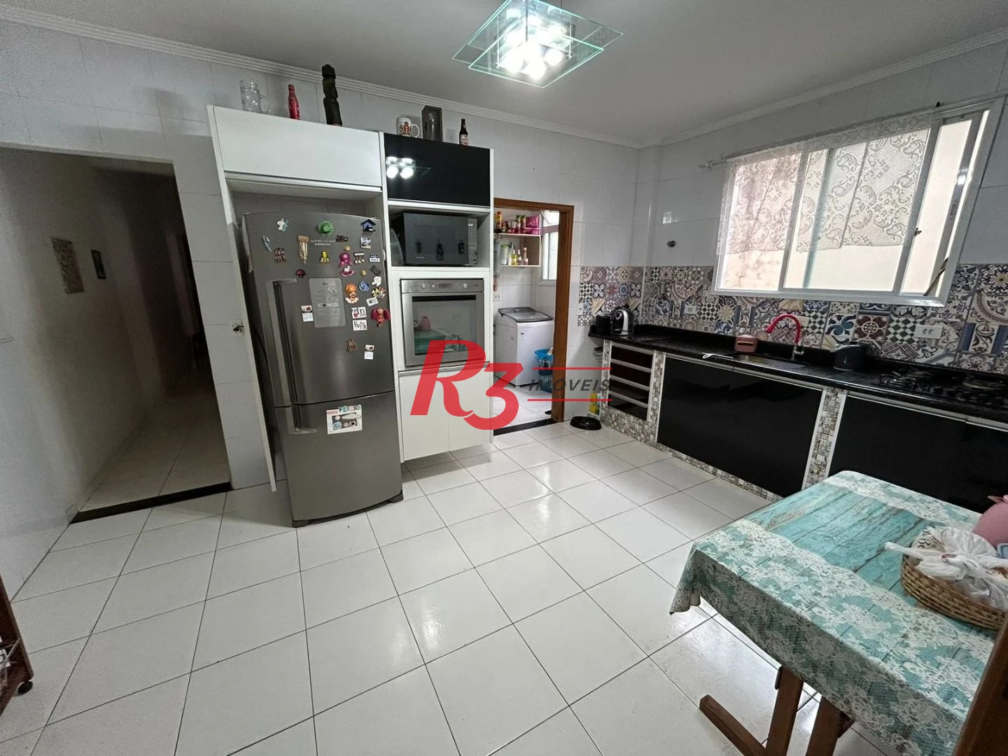 Casa com 4 dormitórios à venda, 235 m² por R$ 1.138.000,00 - Aparecida - Santos/SP
