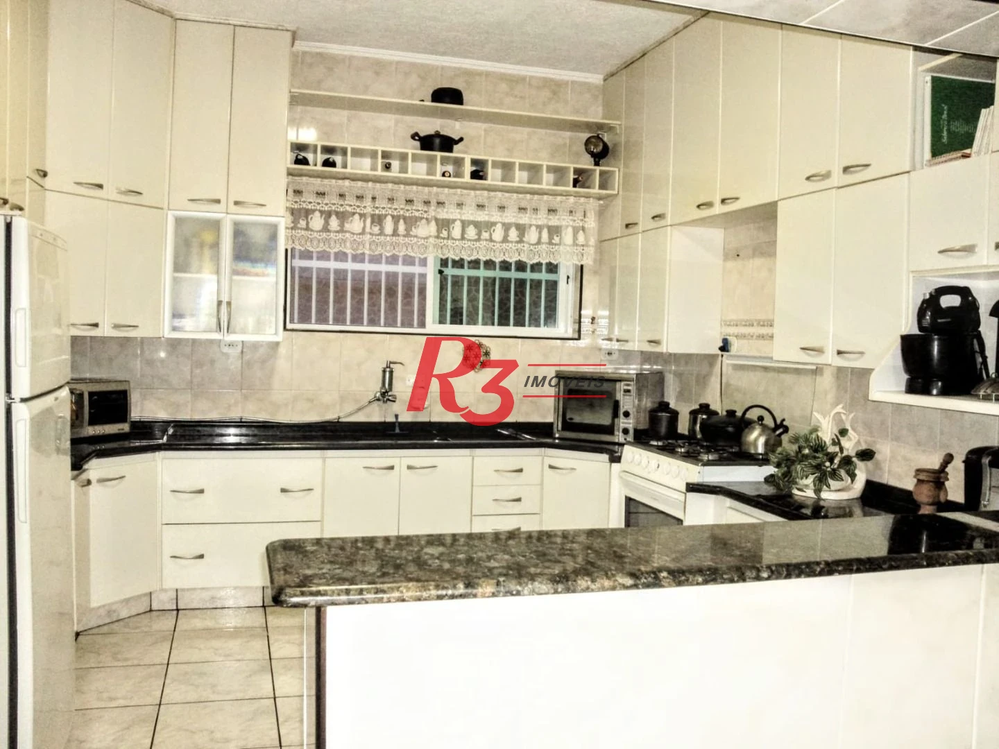 Casa com 2 dormitórios à venda, 118 m² por R$ 450.000,00 - Tupi - Praia Grande/SP