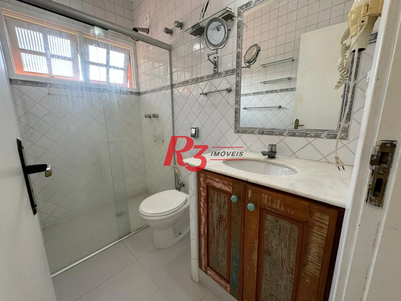 Casa à venda, 283 m² por R$ 4.700.000,00 - Balneário Praia do Pernambuco - Guarujá/SP
