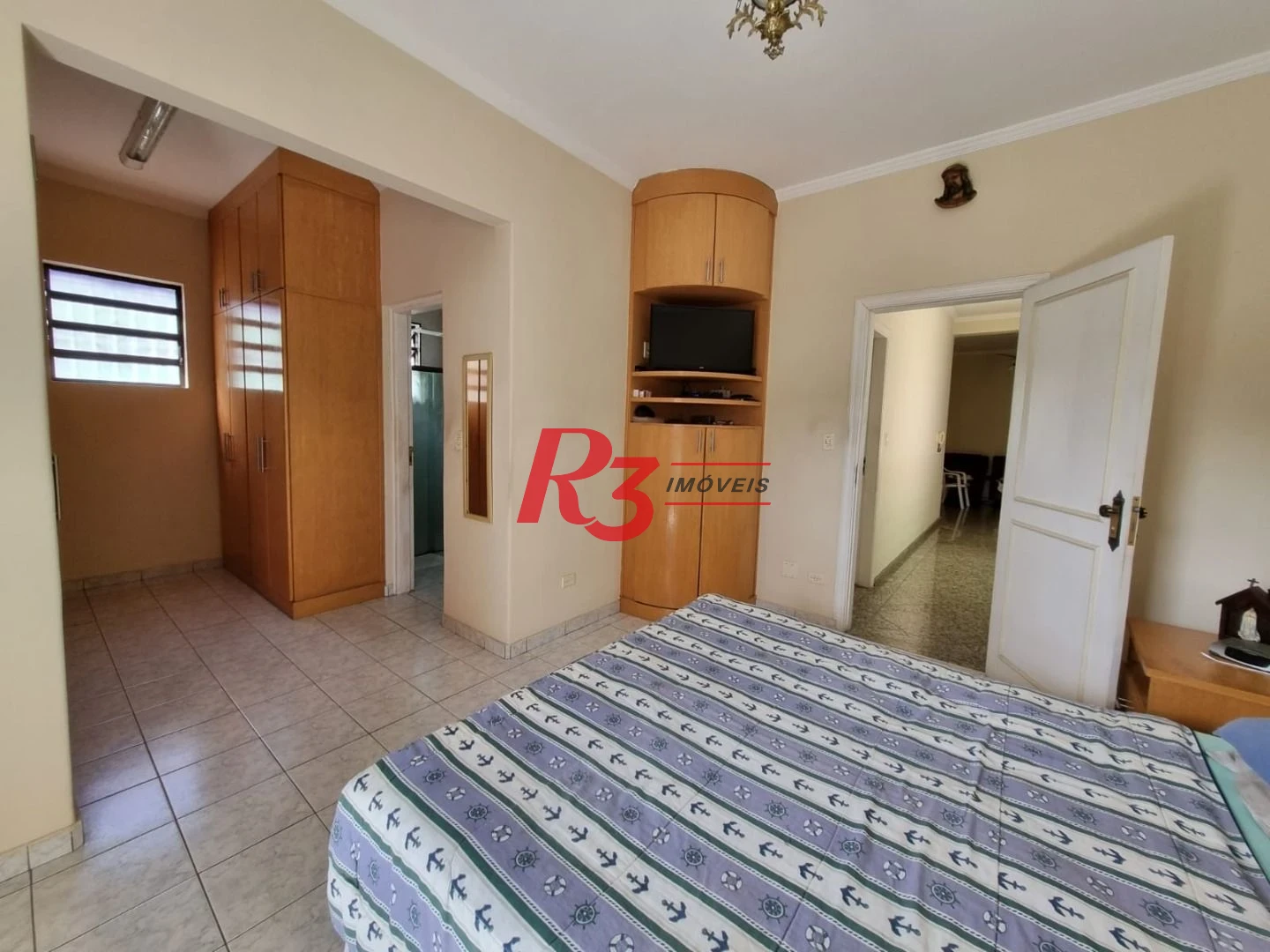 Oportunidade à venda na Vila Belmiro, terreno com 500 m², 2 amplas casas, com 3 dormitórios cada, espaço generoso de quintal e garagem para 6 carros!!